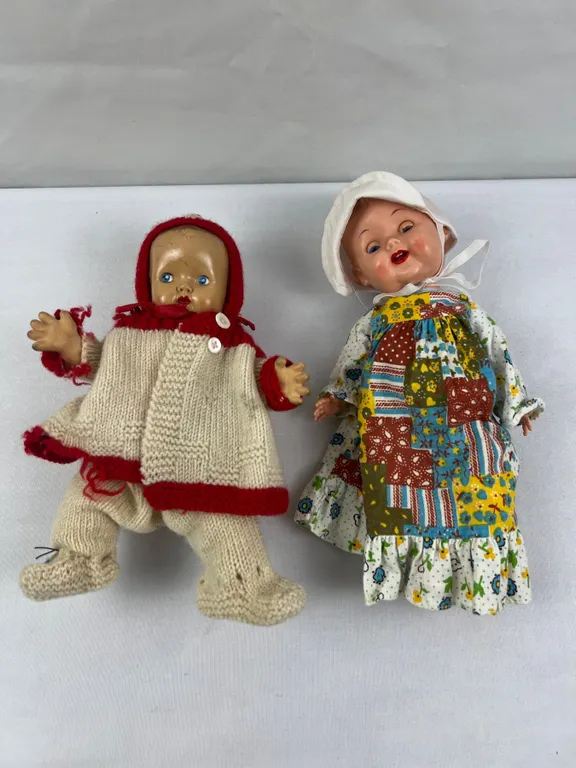 pair of vintage baby dolls