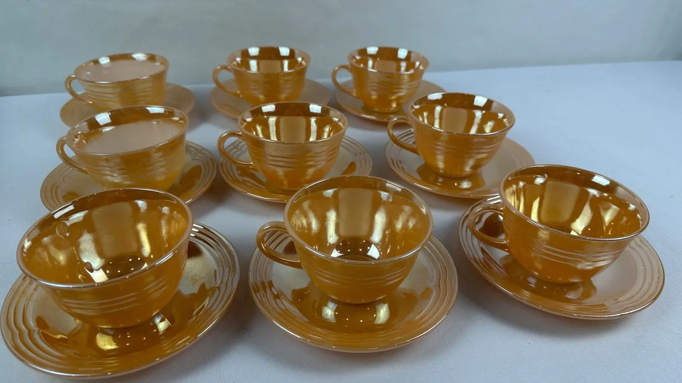 Set of 9 Vintage Fire-King Tea Cups/Saucers in the Peach Lustre Three Band Pattern