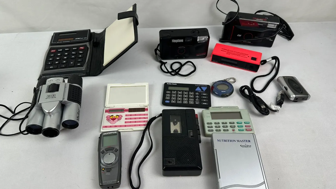Assorted Vintage Cameras, Calculators, Binoculars & more