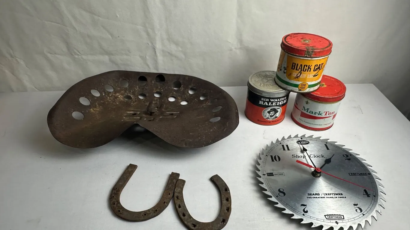 Farm-Man Cave lot--implement seat, Tobacco tins, horseshoes, shop clock
