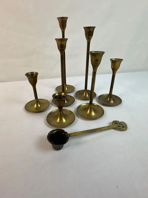 7 Candle Holders Brass?