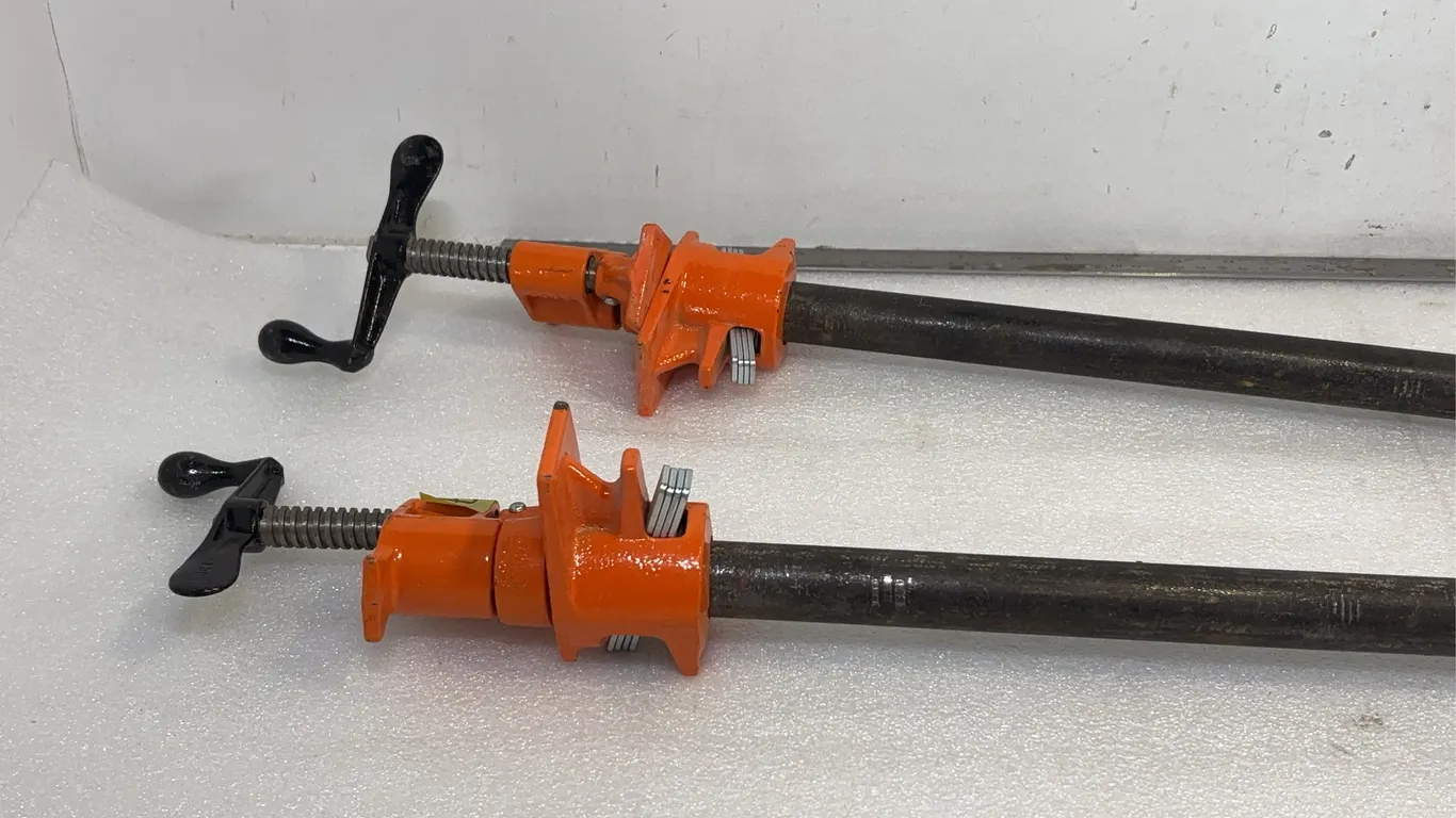 Pair of Pony 1" Pipe Clamp Fixtures w/ Pipe, Approx. 48" and 50" *Unreserved*