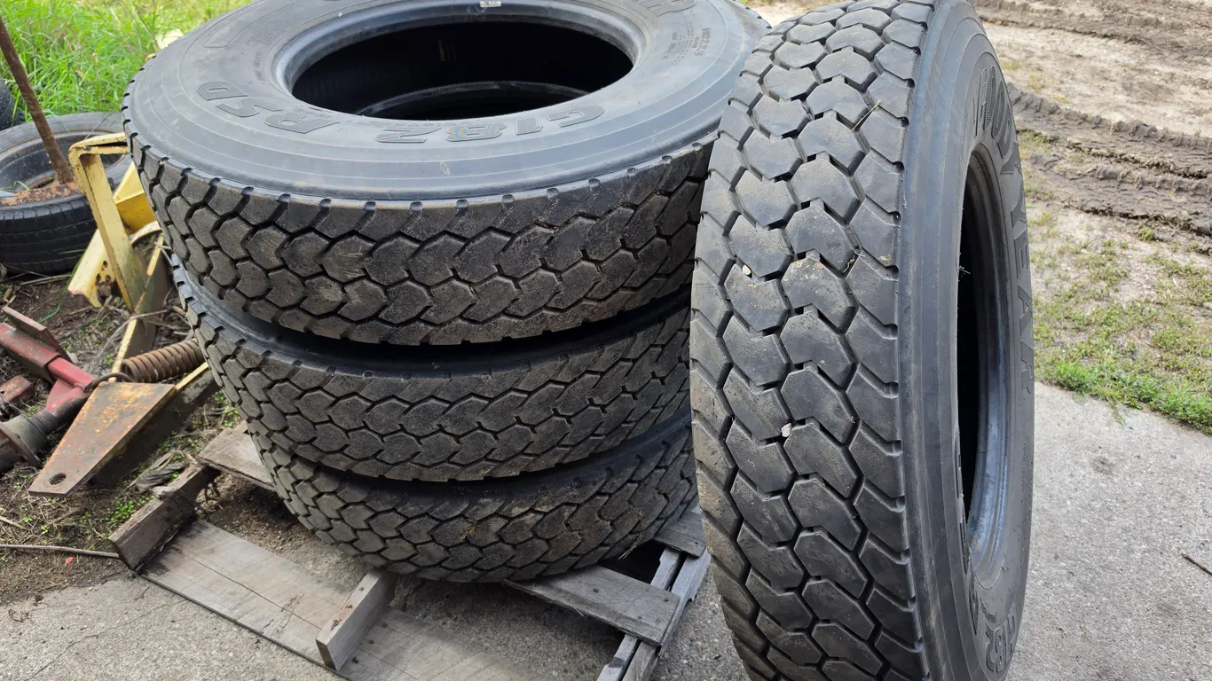 (4) 11R22.5 Good Year Drive Tires, 1 Has a Cut in the Side of the Tread, Still Holds Air