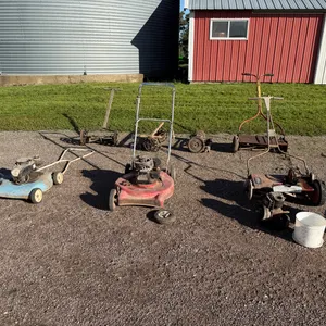 Antique Lawn Mower Collection, One Reel Mower Is Functional