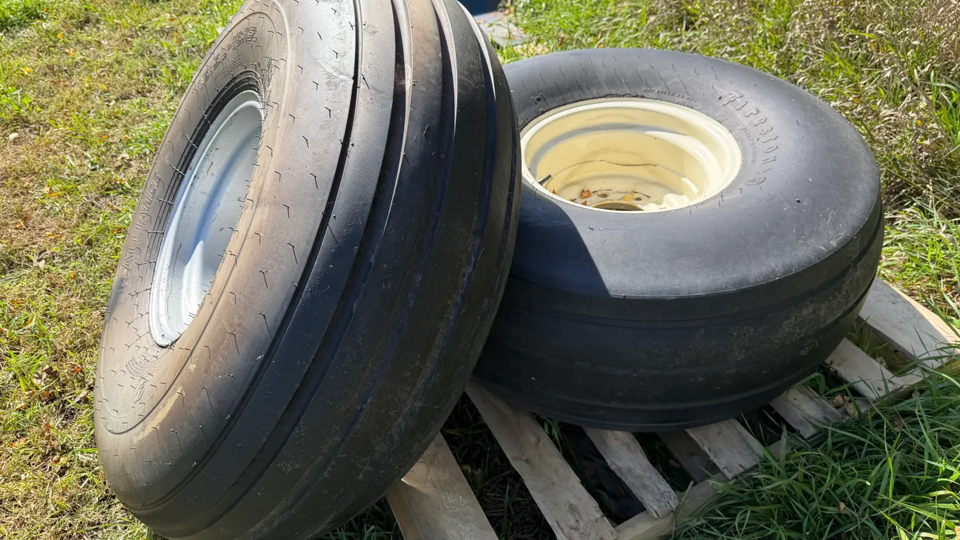 (2) 16.5L-16.1SL Implement Tires On 8-Bolt Rims