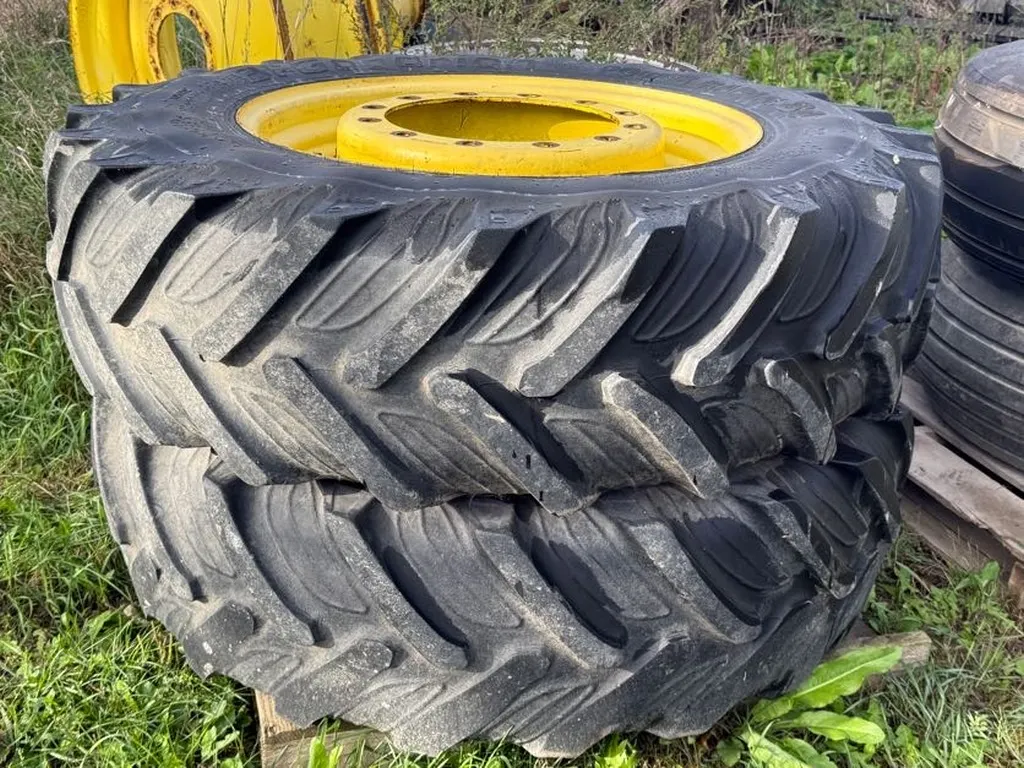 (2) BFGoodrich 14.9R 30 Tires And John Deere 12 Bolt Rims