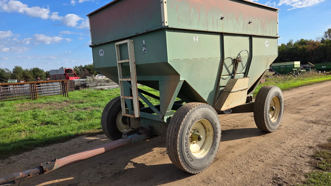 J&M 385 Bushel Gravity Wagon with 11R22.5 Truck Tires. This Item is Located in South Dakota, Therefo