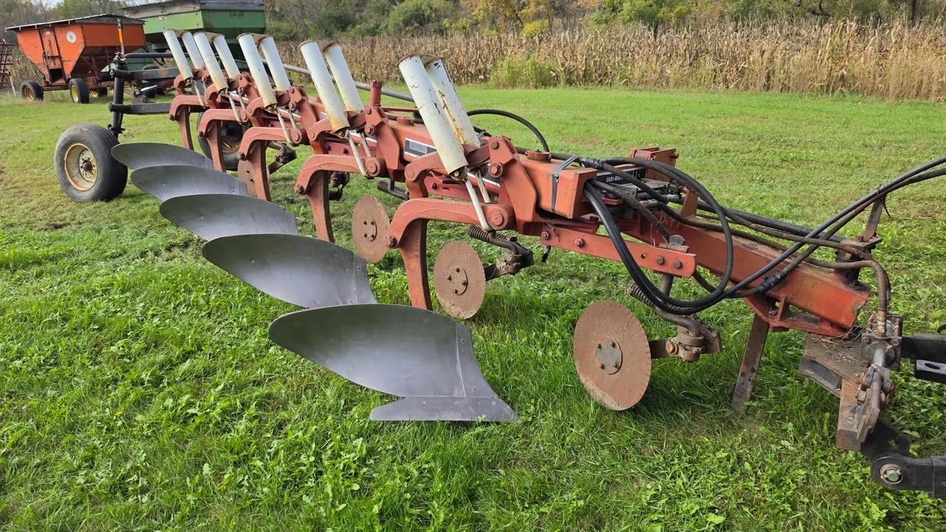 International 735 Variable Width Plow, 5 Bottom with Coulters, Semi Mount, 15” Rear Tire on 6 Bolt R