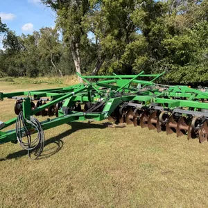 John Deere 2720 9-Shank Disk Ripper, Flat Bar Hydraulic Rolling Baskets, 340/85R18 IMP. Tires On Mai
