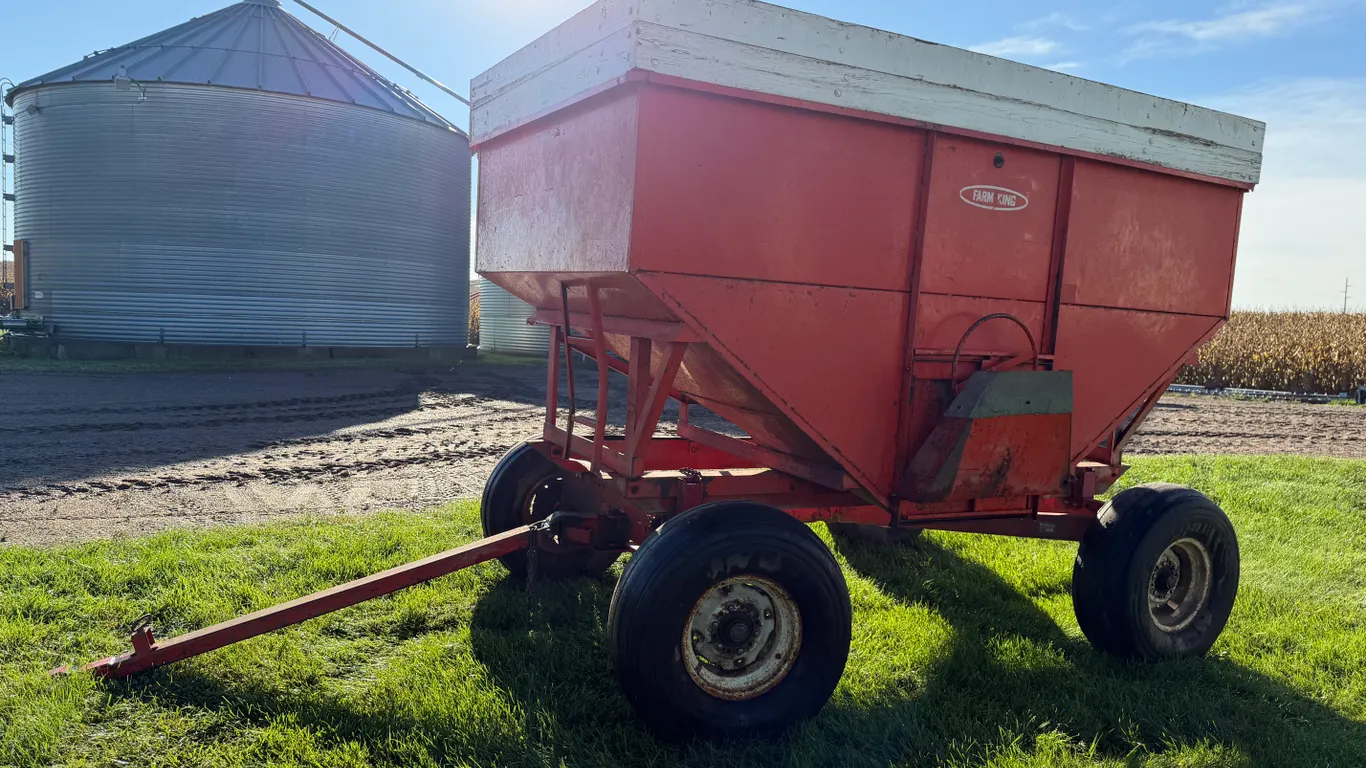 Farm King Gravity Box, 12.5L-15SL Tires, 6-Bolt Hubs, Wooden Stringer, Tires Hold Air, Stored Inside