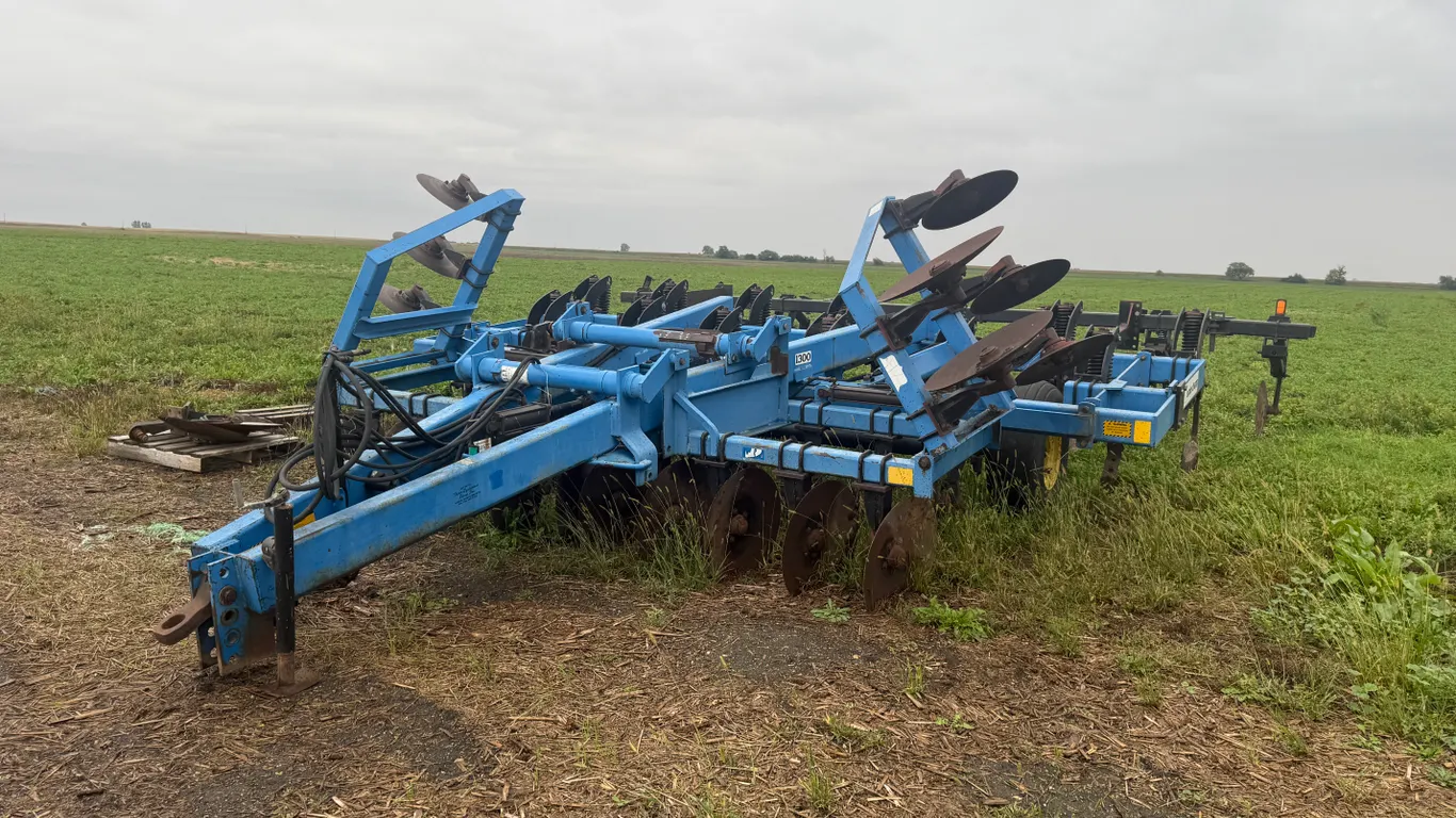 DMI Eclo-Champ Model 1300 Disc Ripper, 13 Shank, Back Row Is Ripper Shanks, Front Row Is Chisel Plow