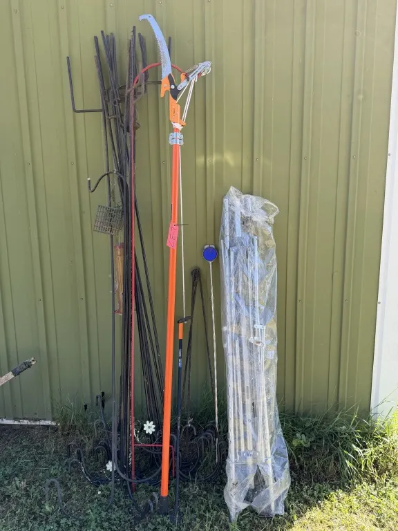Shepherd's Hooks, Pole Saw, And Collapsible Clothesline (Lot 37)