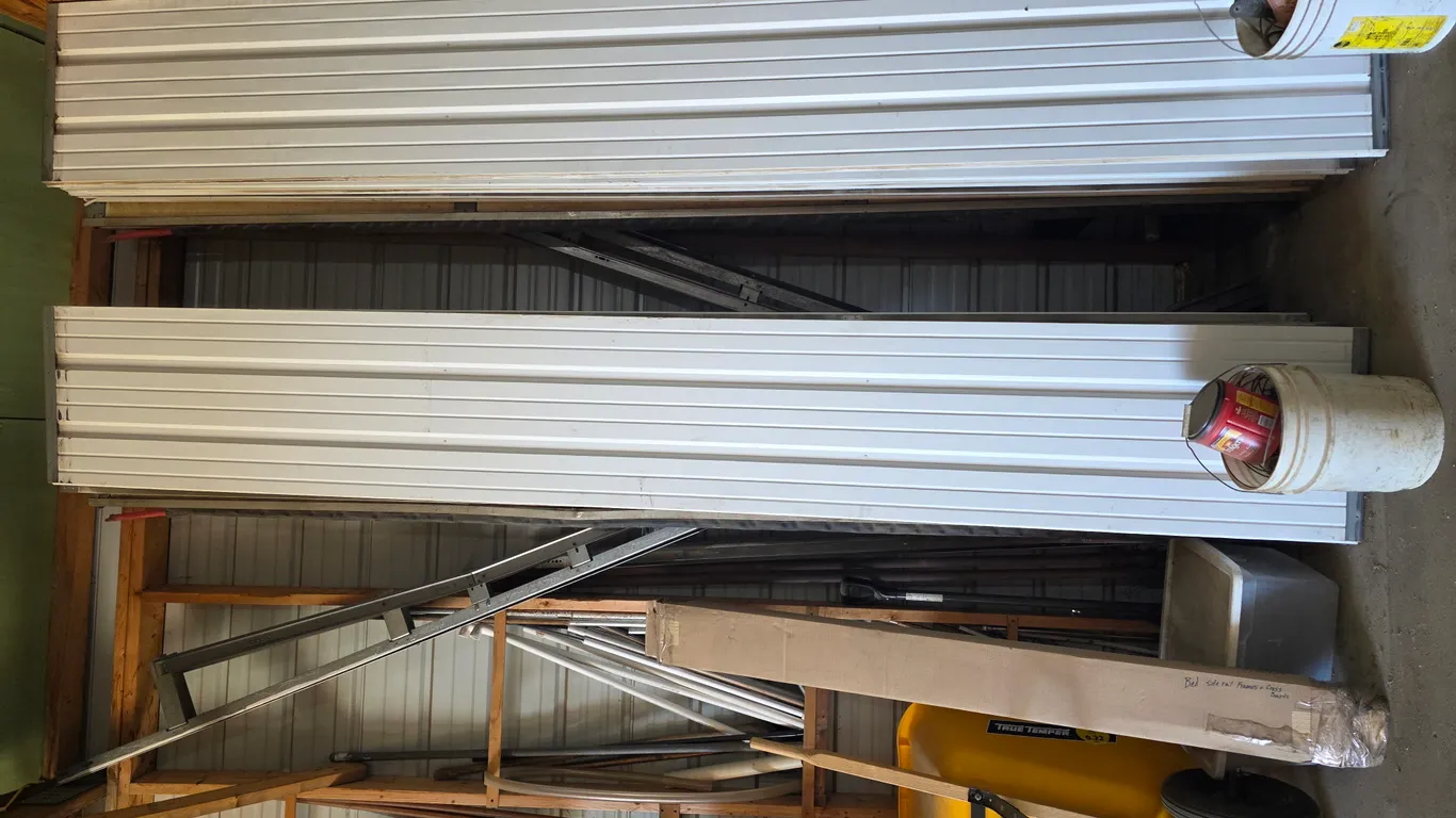 (2) Used 12’ x 9’ Garage Door, ¾” Foam Insulation, Comes with all Track (High Lift Track up to 14’),