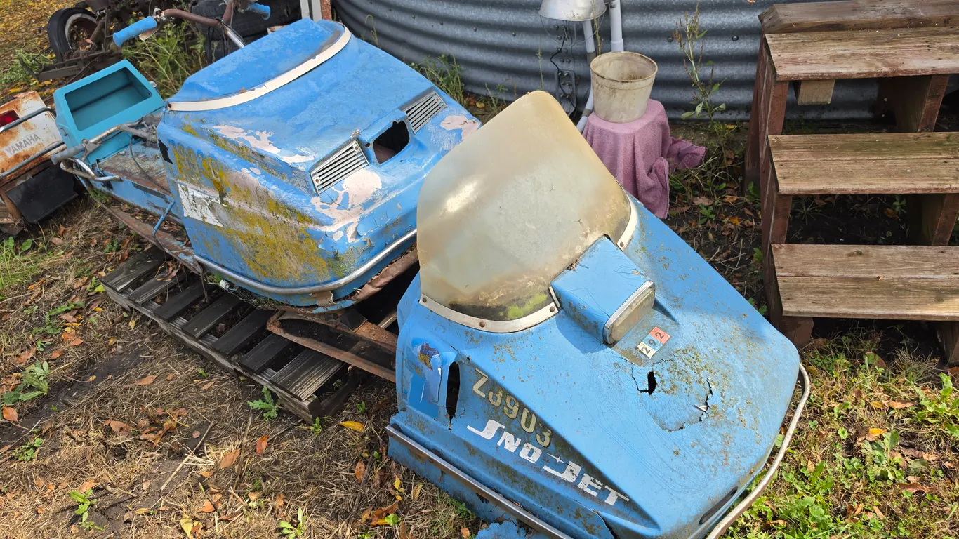 Sno-Jet Snowmobile and 2 Hoods, Has Not Ran in a Number of Years
