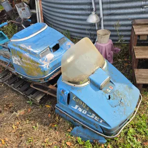 Sno-Jet Snowmobile and 2 Hoods, Has Not Ran in a Number of Years