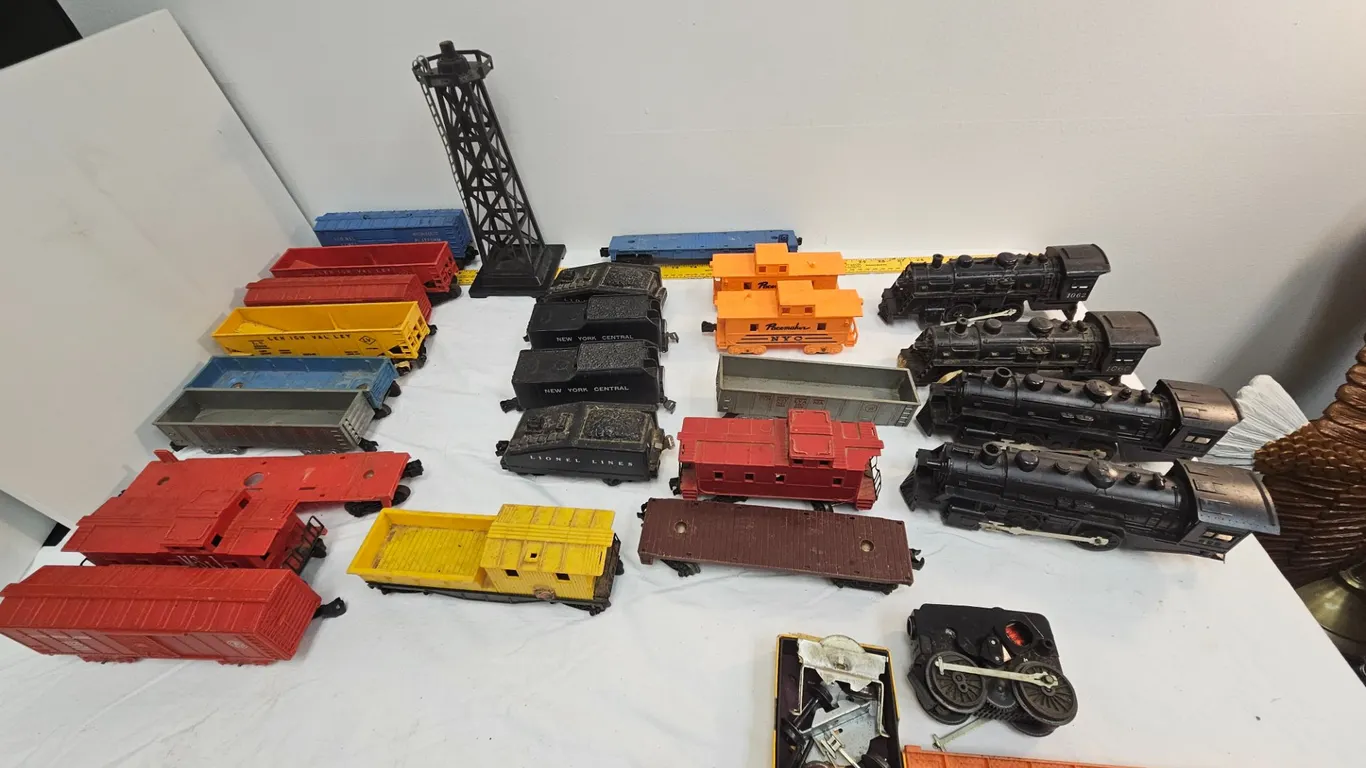 Large Assortment of Lionel Model Train Engines, Cars, Tracks & Electrical Box