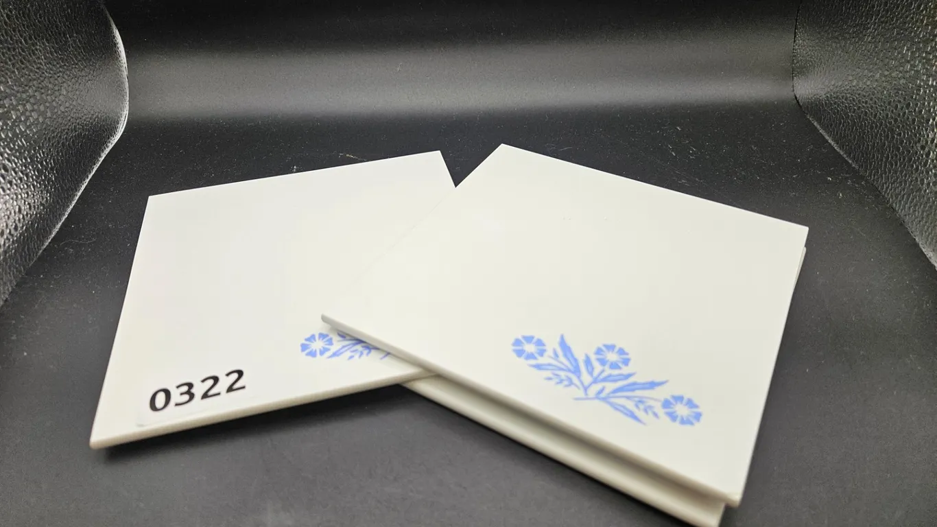 Set of Three White Ceramic Trivets with Blue Floral Design
