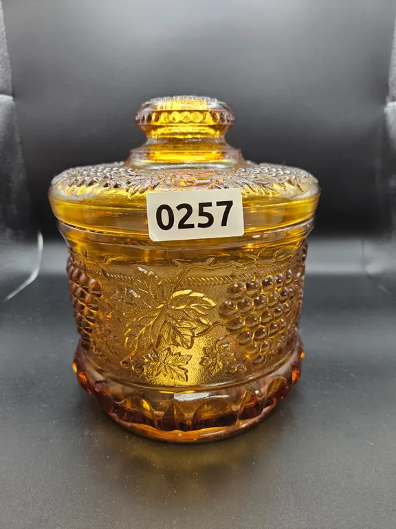 Amber Pressed Glass Lidded Jar with Grape and Leaf Motif