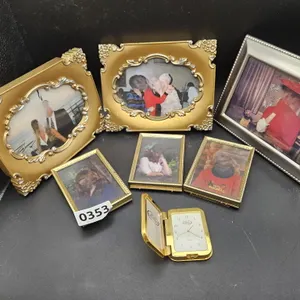 Assorted Gold Tone Photo Frames and Travel Clock
