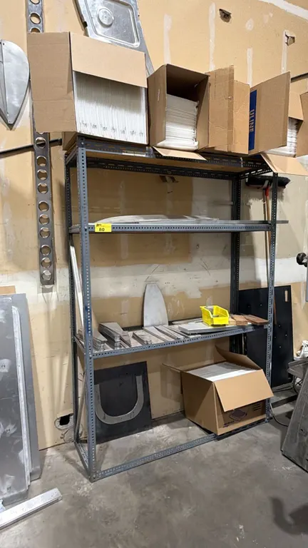 4-TIER METAL SHELVING UNIT WITH ASSORTED CONTENTS INCLUDING; SHIPPING BAGS & ALUMINUM PIECES