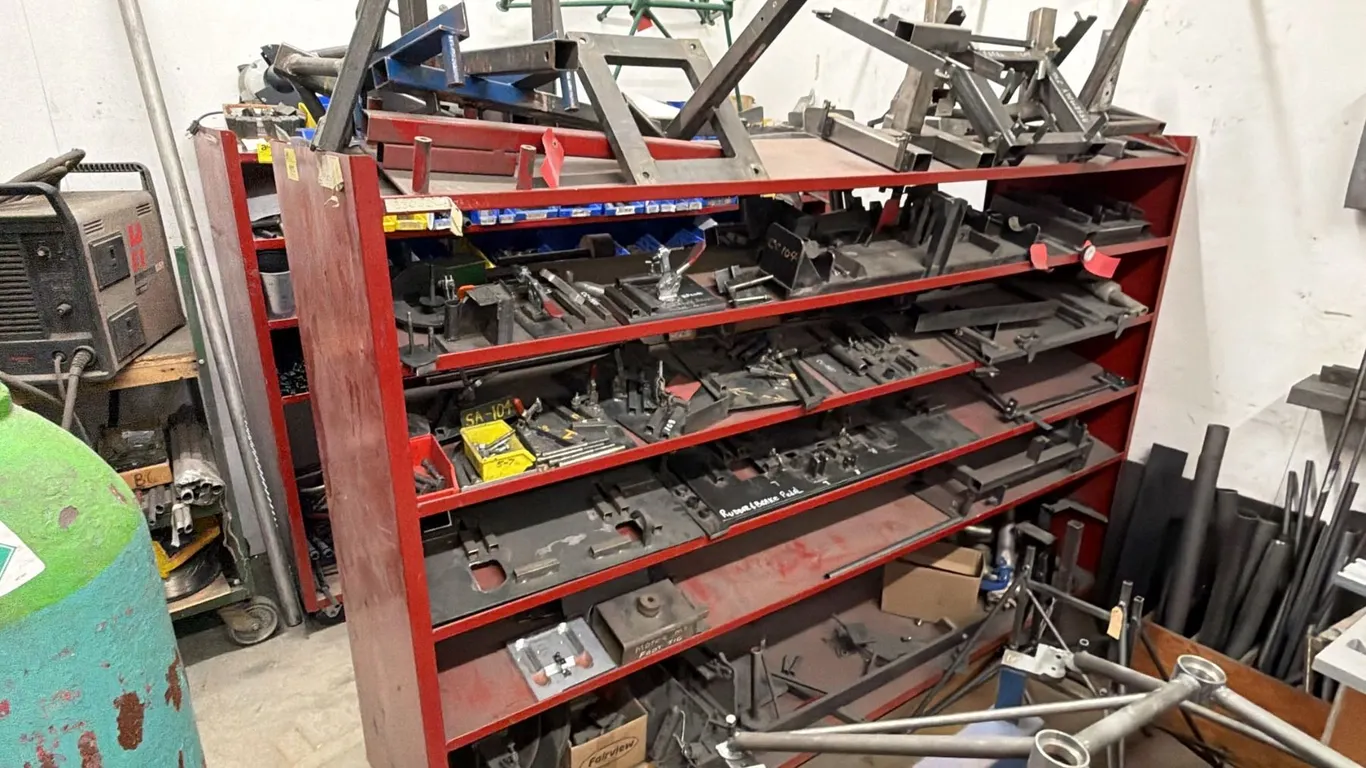 PORTABLE METAL SHELVING UNIT WITH ASSORTED FABRICATED METAL PARTS CONTENTS *MUST TAKE ALL*