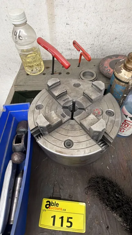 2-TIER METAL STAND WITH ASSORTED CONTENTS INCLUDING; 4-JAW LATHE CHUCK & MORE *MUST TAKE ALL*