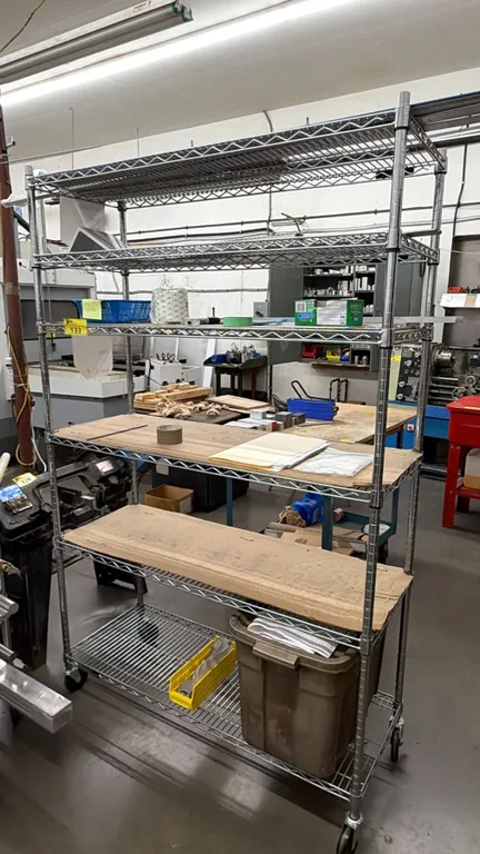 6-TIER METAL ROLLING RACK WITH ASSORTED CONTENTS