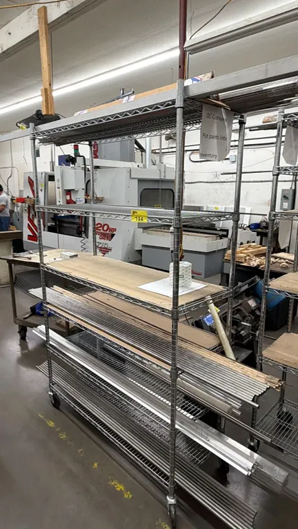 6-TIER METAL ROLLING RACK WITH ASSORTED ALUMINUM CONTENTS
