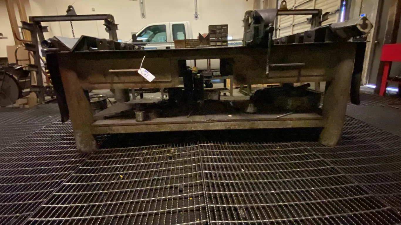 CUSTOMIZED HEAVY STEEL WORK TABLE WITH VISE, RATCHET TIE DOWNS, 2 DRAWERS OF ASSORTED FITTINGS