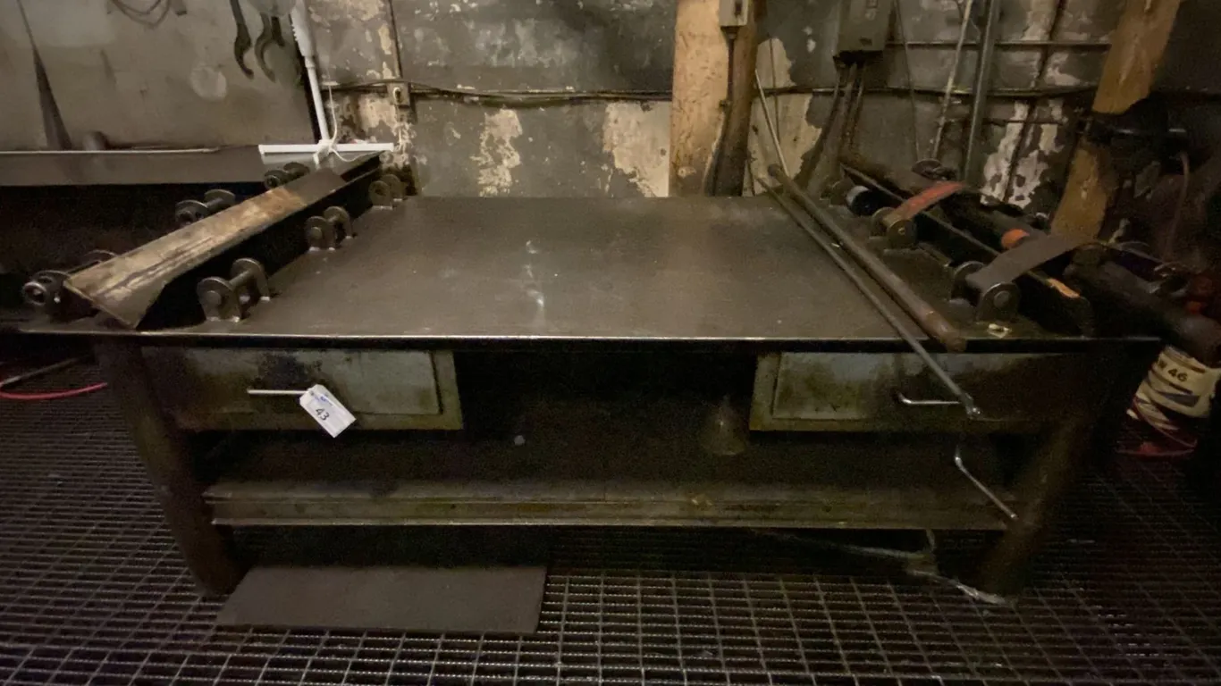 CUSTOMIZED STEEL WORK TABLE WITH RATCHET TIE DOWNS, 2 DRAWERS FULL OF STEEL COMPONENTS & FITTINGS