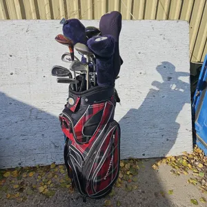 Powerbilt Golf Bag with Assorted Clubs - Qty 1