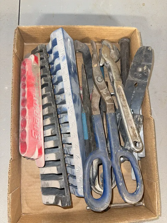 Lots of socket organizers and miscellaneous tools