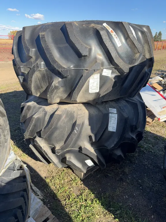 UNUSED 2 tires/rims 28L-26