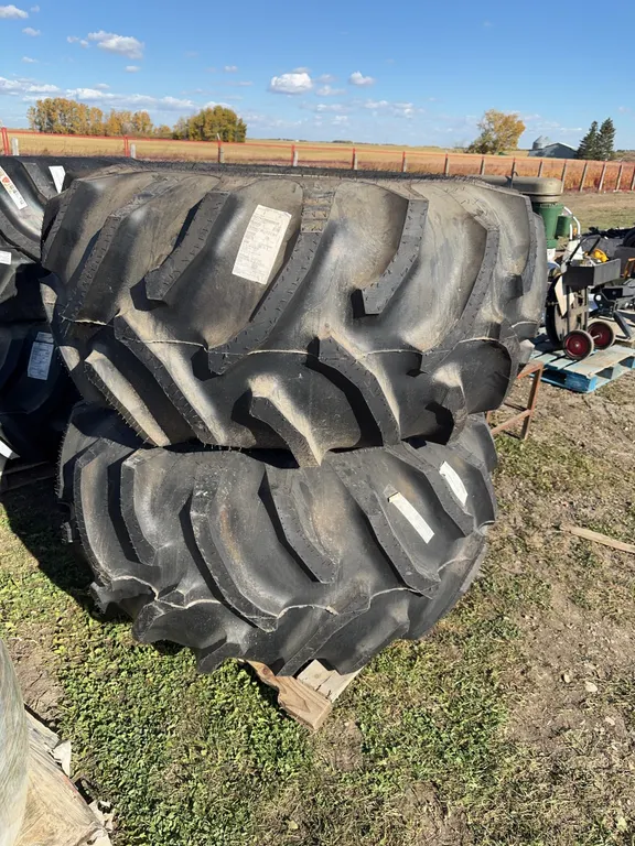 UNUSED 2 tires/rims 28L-26