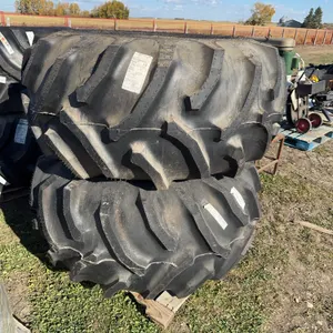 UNUSED 2 tires/rims 28L-26