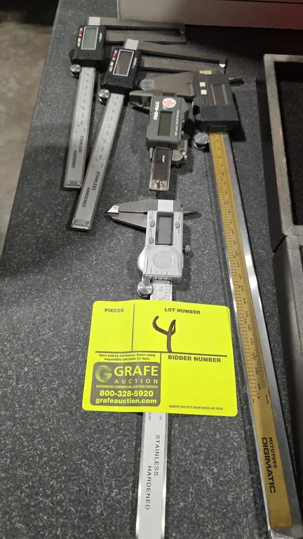 Assorted digital calipers with (3) storage cases. Includes (1) Mitutoyo Digimatic 12"/300mm caliper, (1) Fowler Pro-Max caliper, (2) 6"/150mm extended