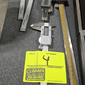 Assorted digital calipers with (3) storage cases. Includes (1) Mitutoyo Digimatic 12"/300mm caliper, (1) Fowler Pro-Max caliper, (2) 6"/150mm extended