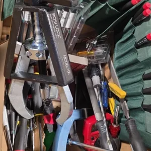 Assorted hand tools lot. Includes Posi Lock Model 106 gear and bearing puller, Wiha 26590 8-piece precision nut driver set, adjustable wrench, digital