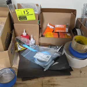 Assorted shop and packaging supplies. Lot includes Mitutoyo gauge blocks, Uline reclosable poly bags, assorted adhesive tape rolls, desktop tape dispe