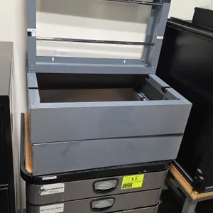 Metal portable 5-drawer tool cabinet with contents and metal spool rack. Features 5 pull-out drawers and top surface. Includes assorted hand tools, ta
