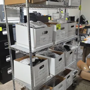 Chrome 5-tier wire shelving unit. Features (5) adjustable wire shelves. 48"W x 18"D x 77"H. Mounted on casters with donut bumpers. Contents not includ