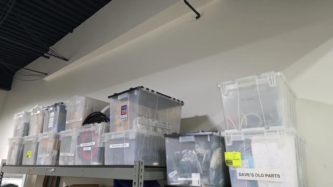 Assorted poly storage totes with contents. Includes (14) plastic hinged-lid storage totes containing assorted pneumatic tubing, cables, thermocouple a
