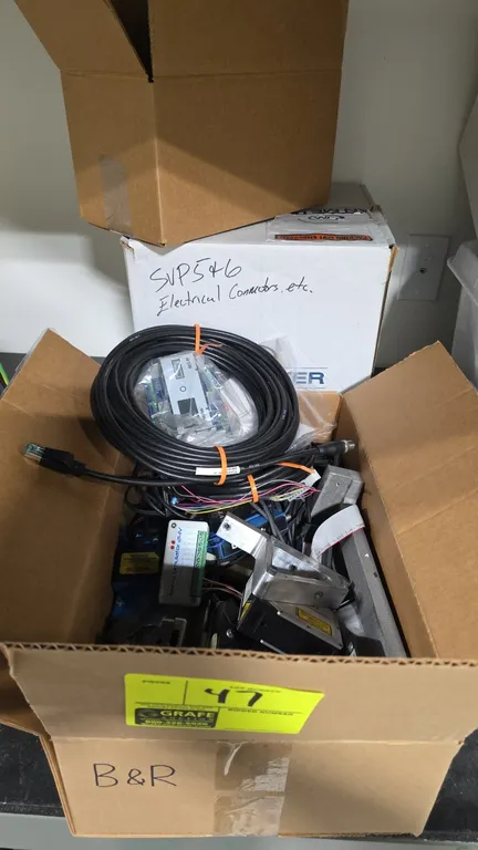Assorted automation components, cables, and brackets. Lot includes B&R X20 system modules, Keyence and SICK sensors, Raytek MI3-M sensor interface, a