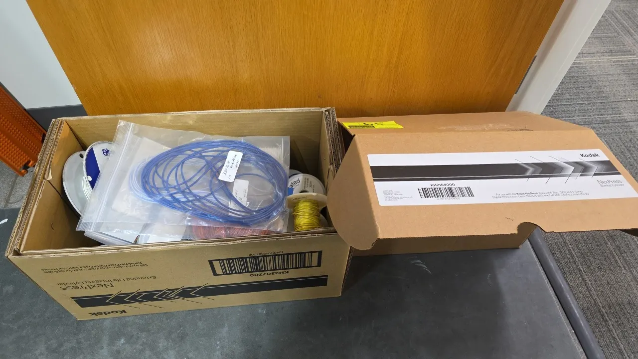 Assorted wire spools and coils lot. Includes partial spools and wire lengths featuring high-temperature braided wire, thermocouple wire, and lead wire
