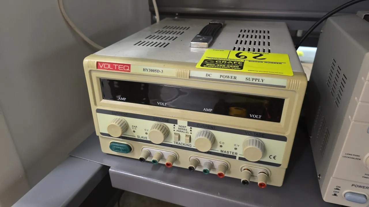 Volteq HY3005D-3 DC power supply. Features dual digital amp and volt displays, master and slave tracking controls, front terminal binding posts, top c