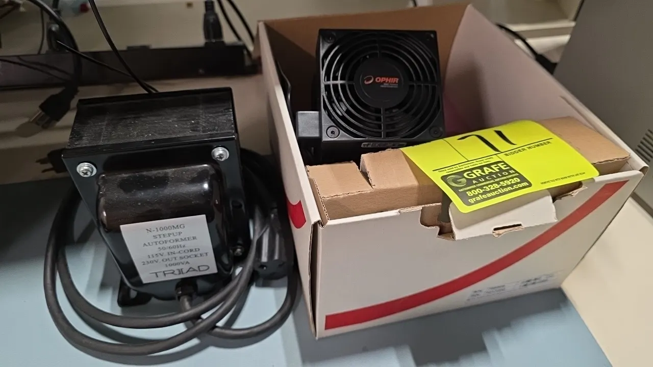 Ophir BDFL500-BB-50 fan-cooled laser power sensor and Triad N-1000MG step-up autoformer. Sensor features integrated cooling fan, power adapter, and mo