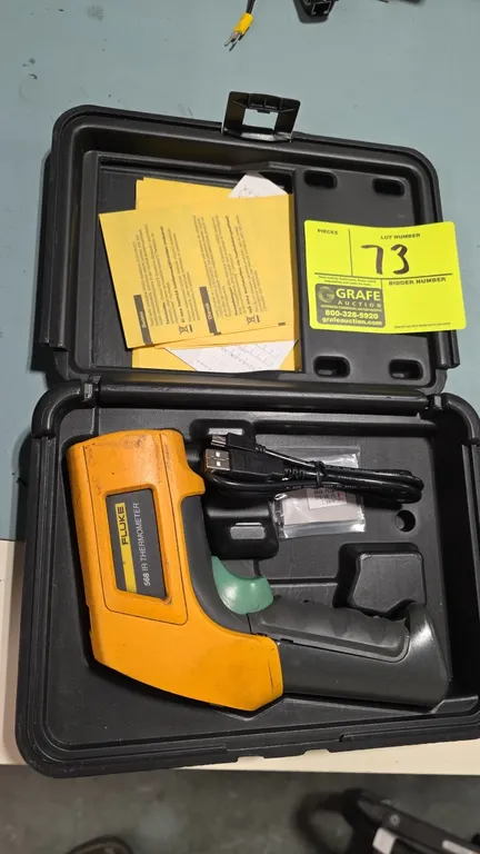 Fluke 568 infrared thermometer. Features a 50:1 distance-to-spot ratio, digital backlit LCD screen, laser sighting, and trigger activation. Includes U