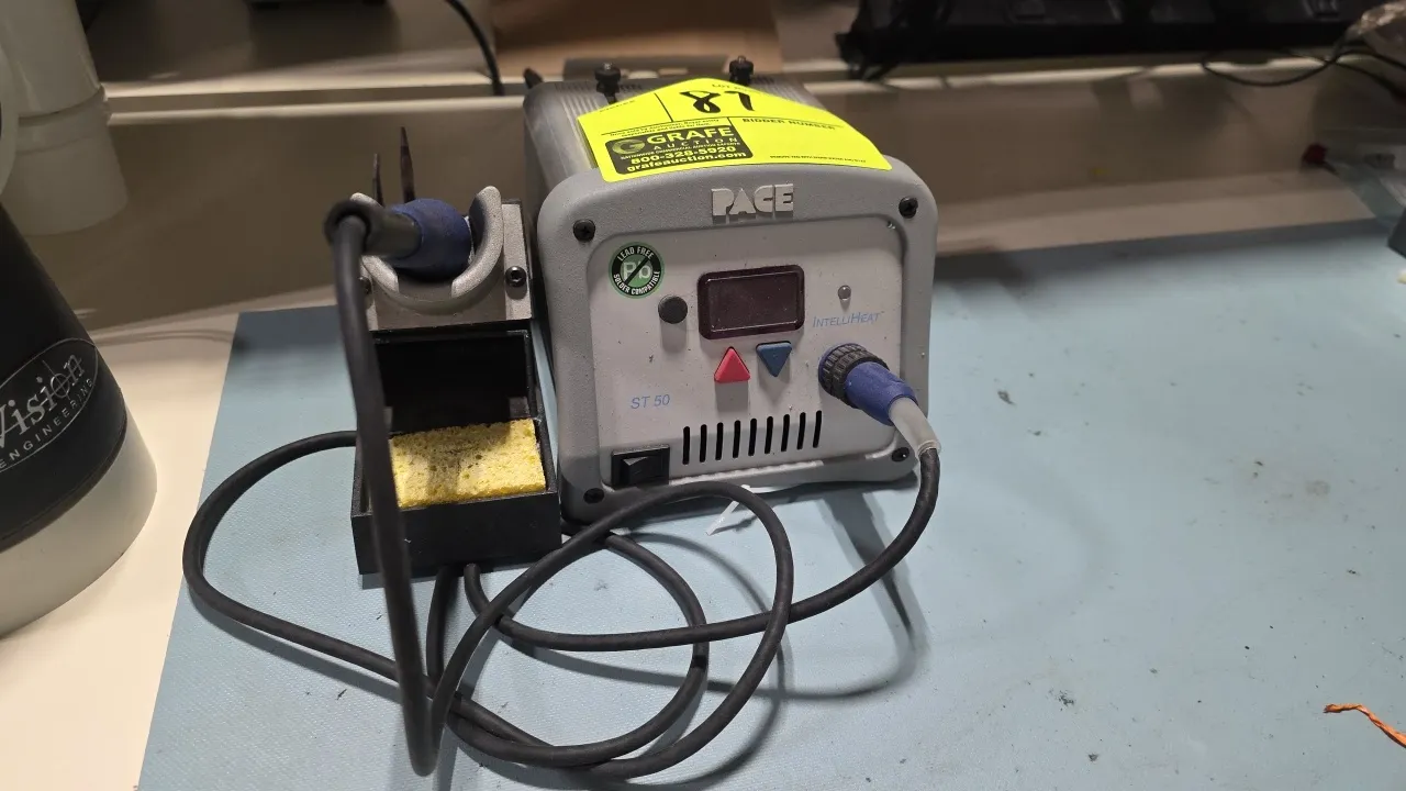 Pace ST 50 IntelliHEAT digital soldering station. Features digital display, push-button temperature controls, and lead-free compatibility. Includes so