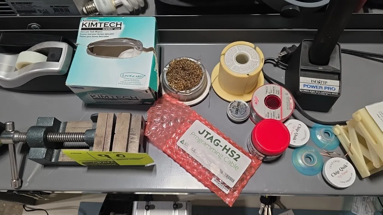 Electronics workbench and soldering tools lot. Includes Iso-Tip Power Pro cordless soldering iron with charging base, precision mini vise, LitezAll LE