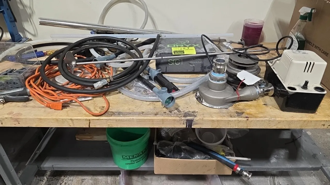 Assorted equipment and maintenance supplies. Includes electric condensate pump, stainless steel mixer shaft, pulley assembly, spray nozzle, extension